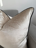 Cream velvet cushion cover with black piping