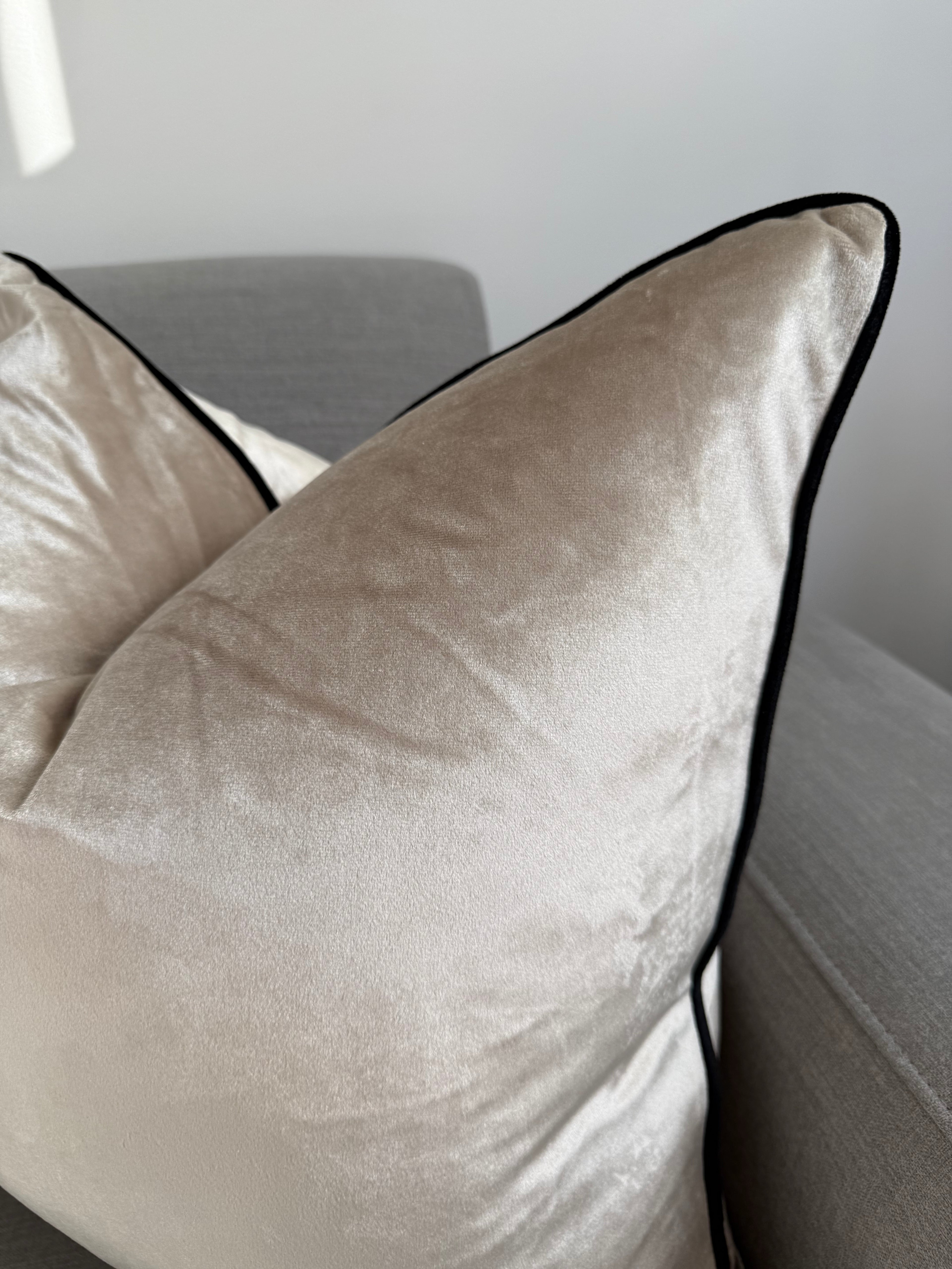 Cream velvet cushion cover with black piping