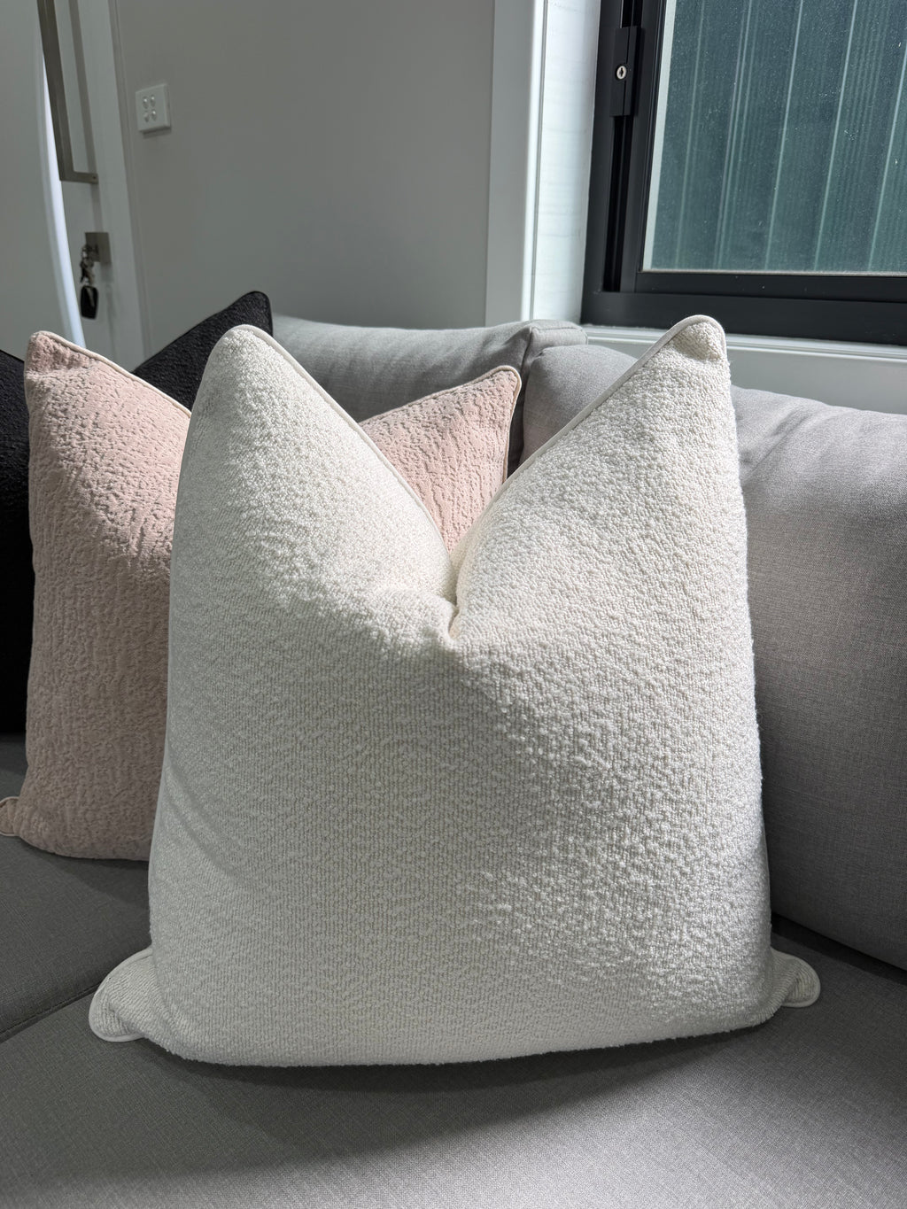 White boucle cushion cover